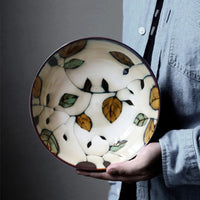 Hand-Painted Ceramic Bowls and Plates