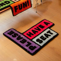 Tufted Letter Irregular Floor Mat